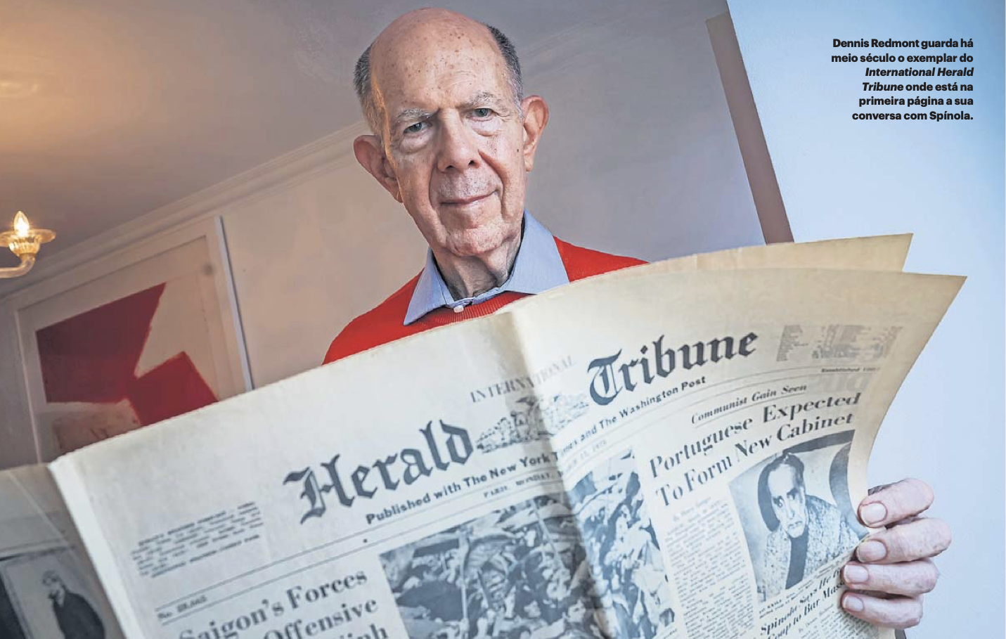 Dennis Redmont with historic newspapers
